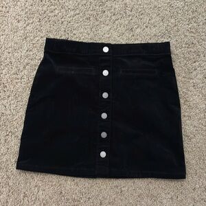 Black Miniskirt with buttons and faux front pockets